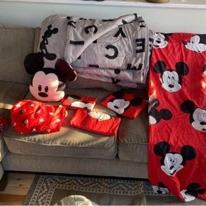 Mickey Mouse twin comforter set with decorative pillow and curtains.